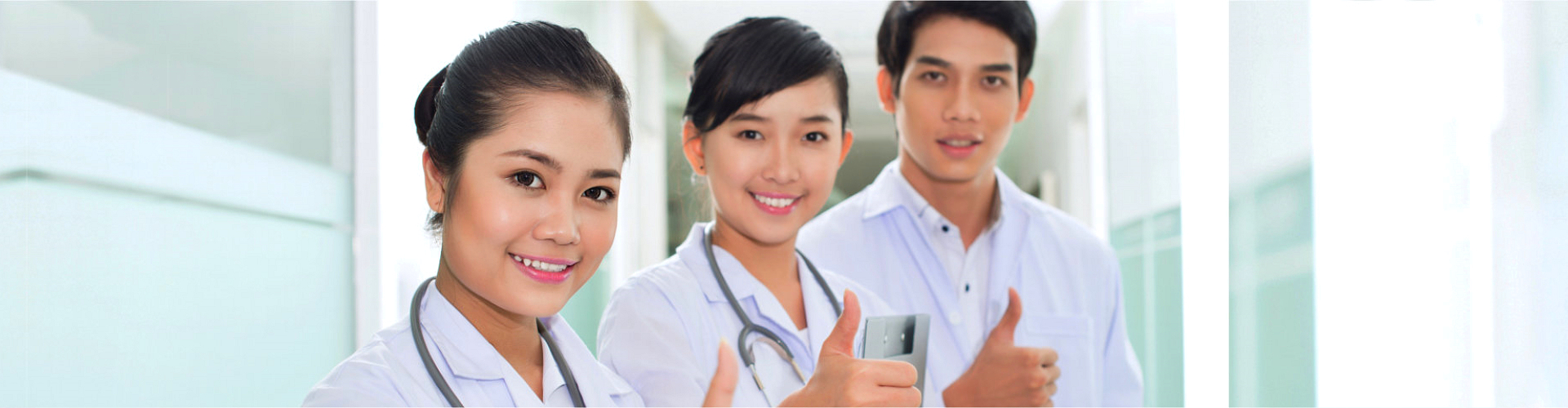 nurses signing thumbs up